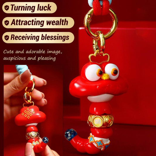 Money-Making Snake Key Ring riipus